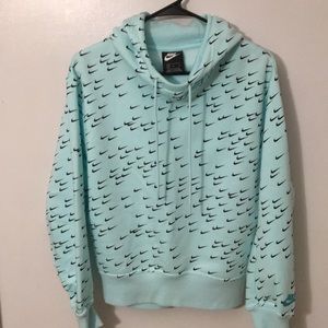 Nike hoodie with logo all over.